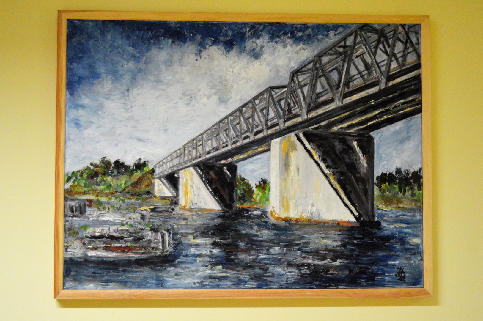 Obraz przedstawia most kolejowy